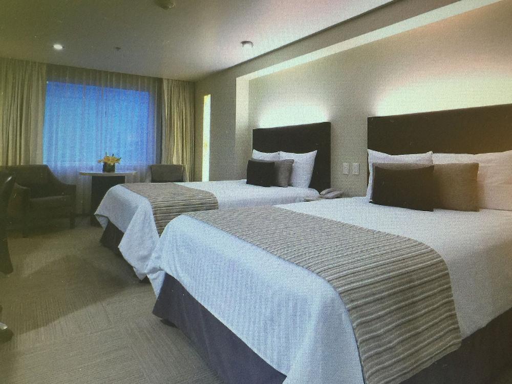 Отель Emporio Reforma Мехико Экстерьер фото A room at the hotel