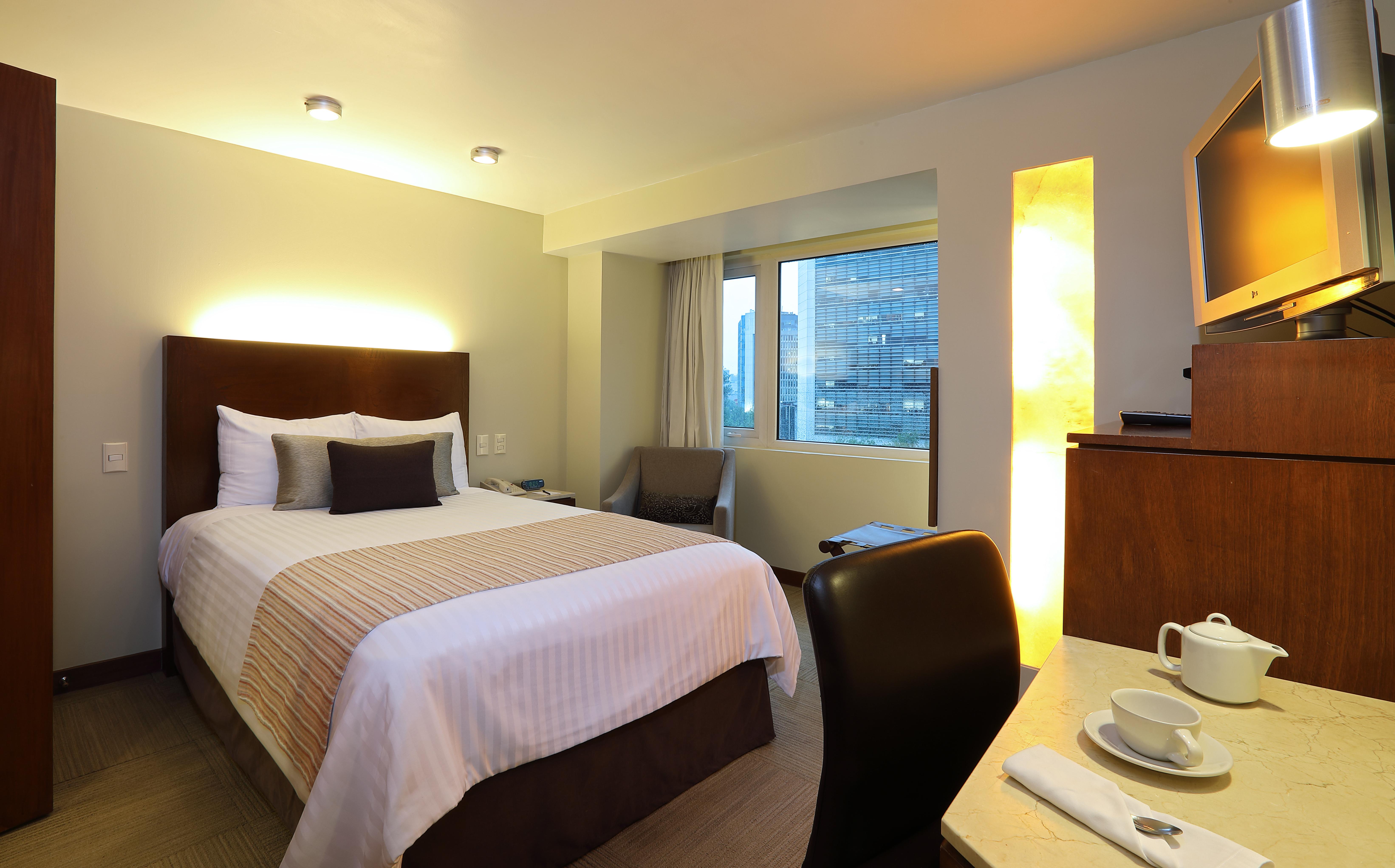 Отель Emporio Reforma Мехико Экстерьер фото A room at the hotel