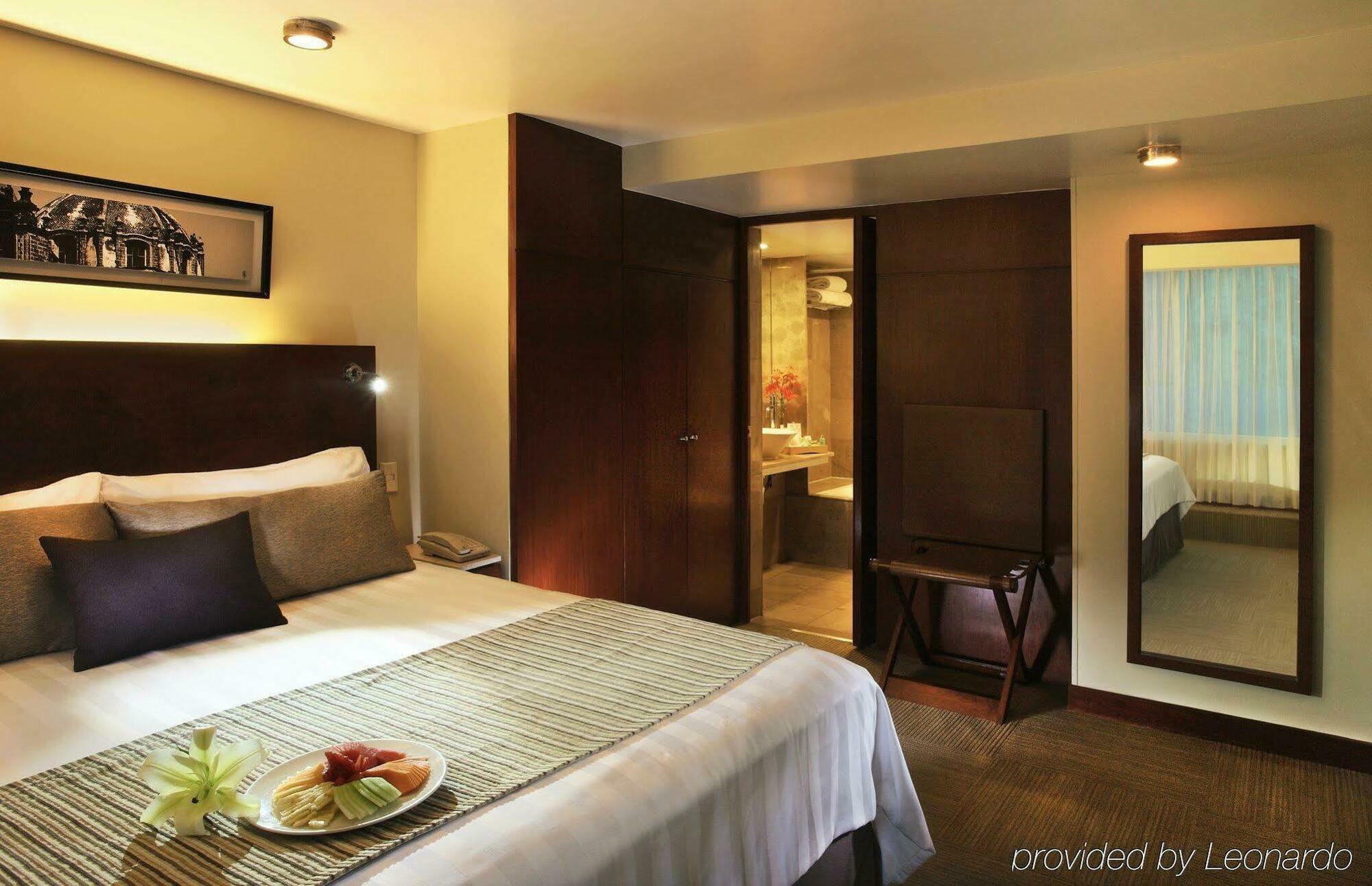 Отель Emporio Reforma Мехико Экстерьер фото A room at the hotel